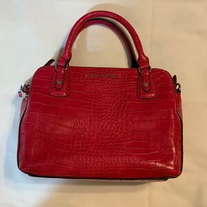 Dana Buchman pink handbag with Crossbody strap included NWOT.